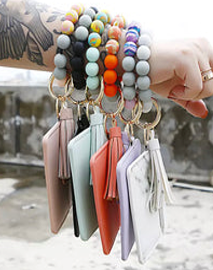 PULSERA CON BILLETERA DE MANO